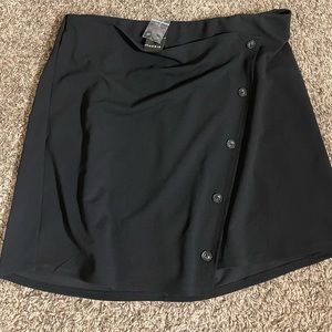 New with tags torrid black scuba skirt with buttons